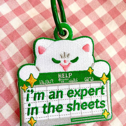 Expert in the Sheets - Embroidered Keychain