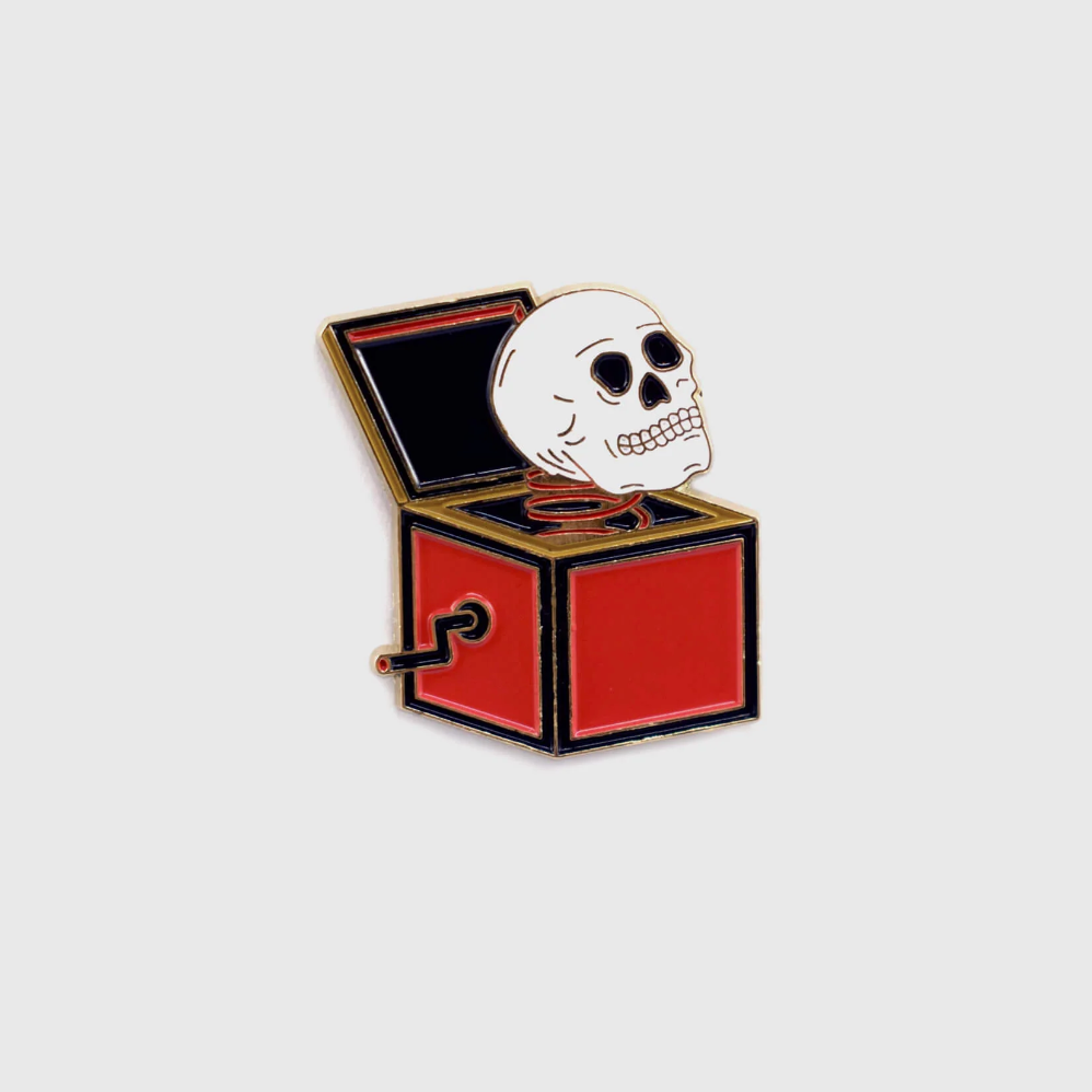 Skull In A Box Enamel Pin