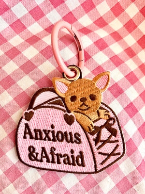 Anxious and Afraid Tiny Dog in Purse Embroidered Keychain